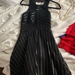Luxury flattering dress with leather accents